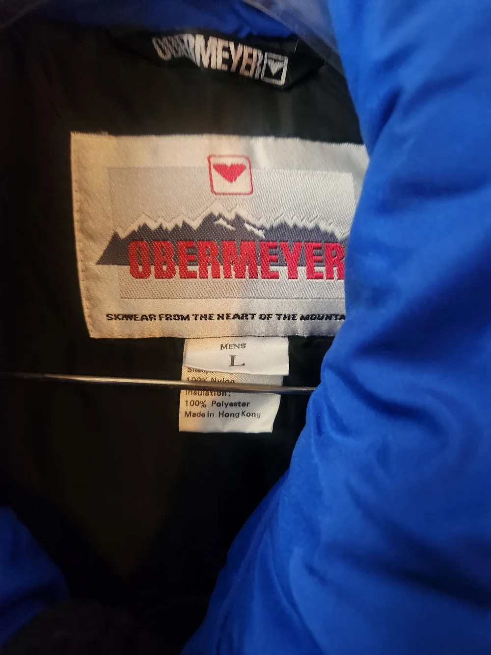 Obermeyer Men's Ski Jacket in Blue, Purple, Black with Pink Accents